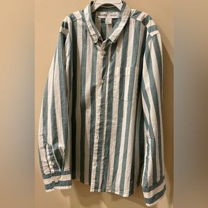 An old navy button down shirt for boys with green and white stripes.